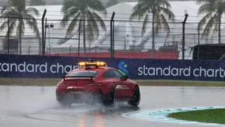 Start of Malaysian F1 race delayed by huge downpour