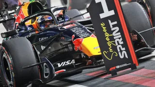 Verstappen beats Russell's old-spec Mercedes to Singapore sprint pole