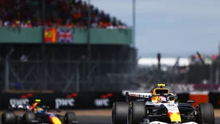 Liam Lawson escapes penalty for "aggressive" British GP sprint defence versus Isack Hadjar