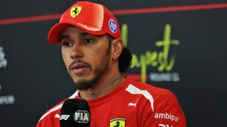 Lewis Hamilton branded UFC champion a “coward” after airborne pig hunt